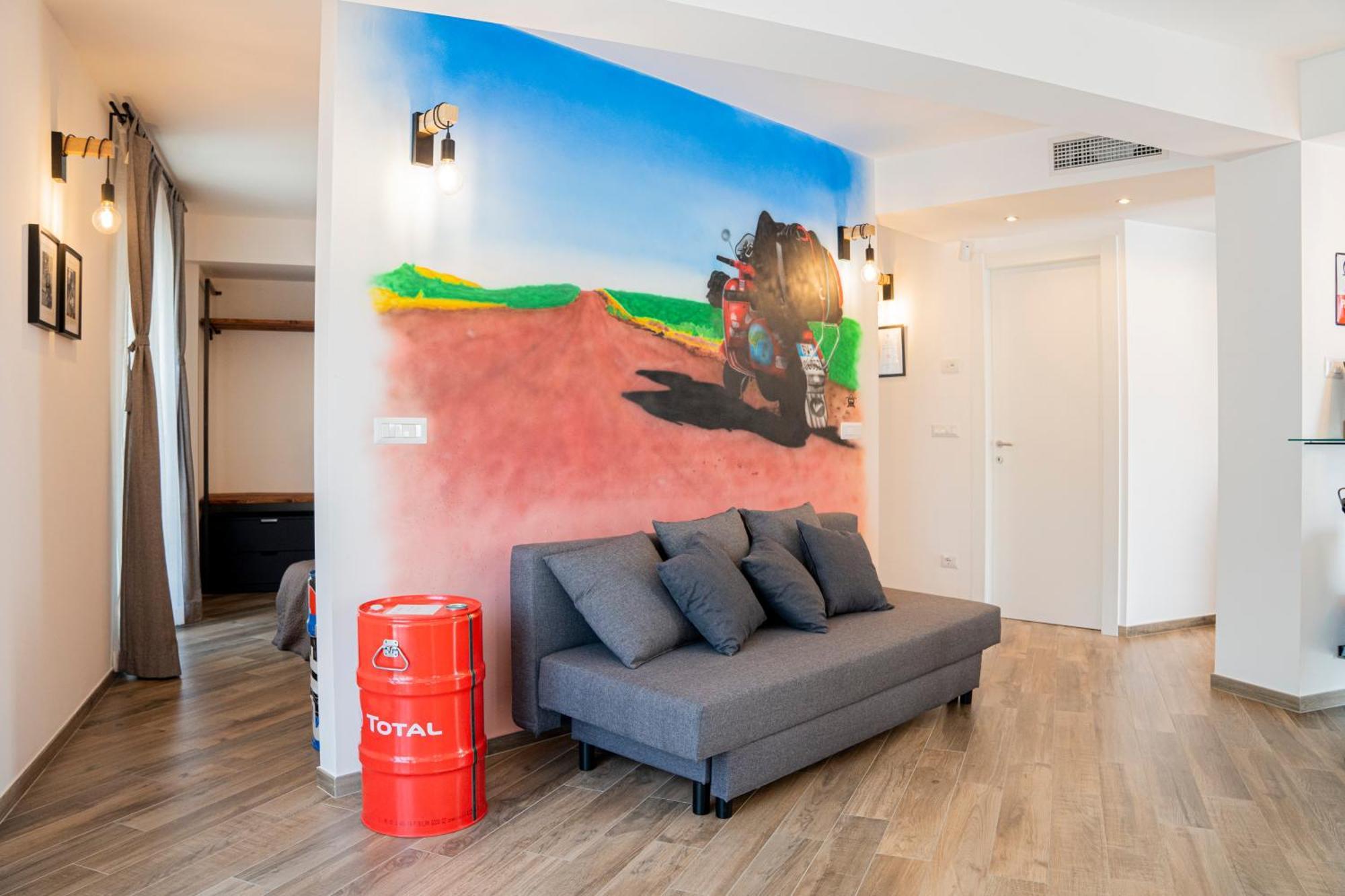 Vespa Apartments Moneglia Rom bilde